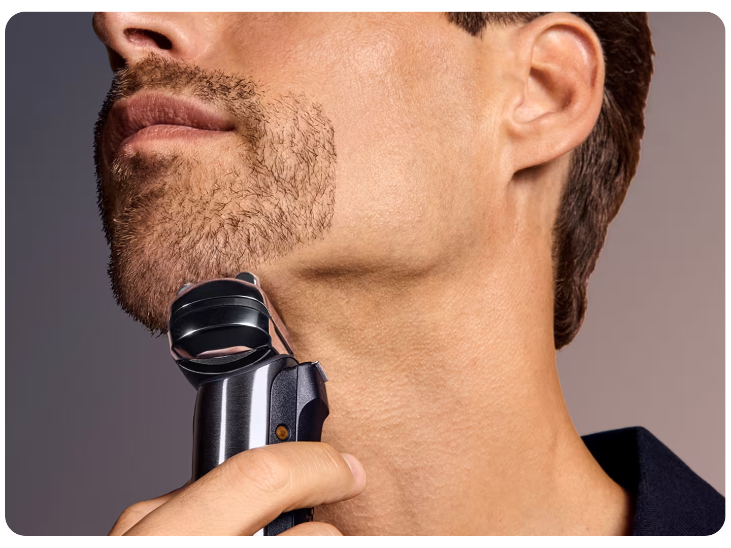 Man shaving with Braun NEVO