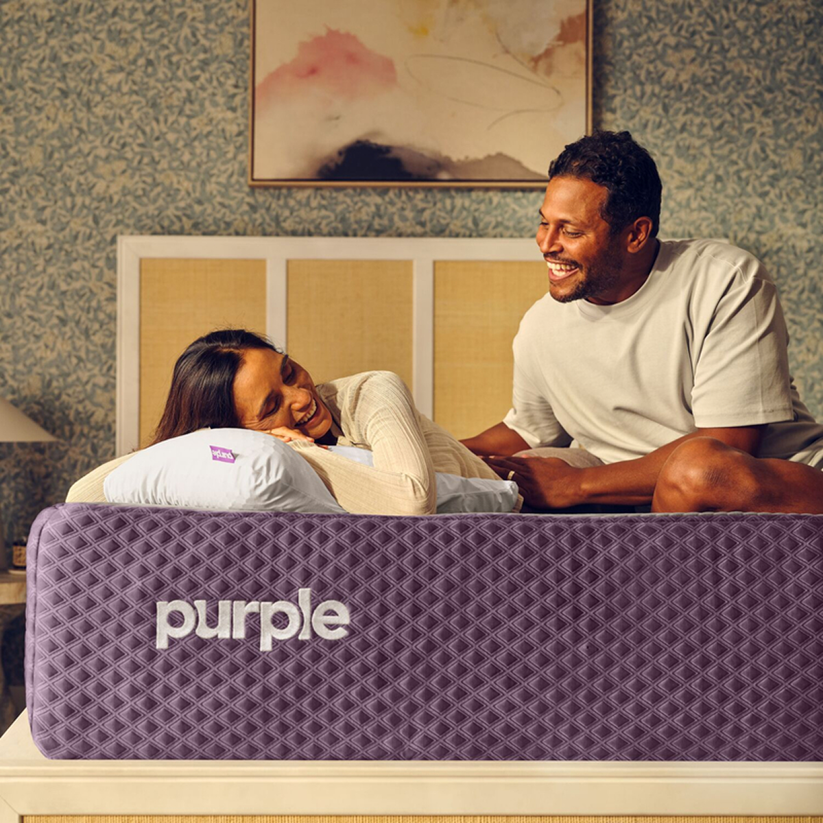Couple on Purple mattress