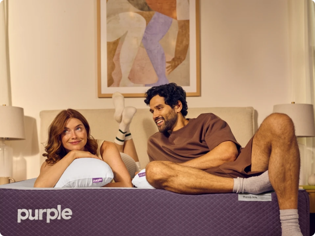 Two individuals on Purple Mattress