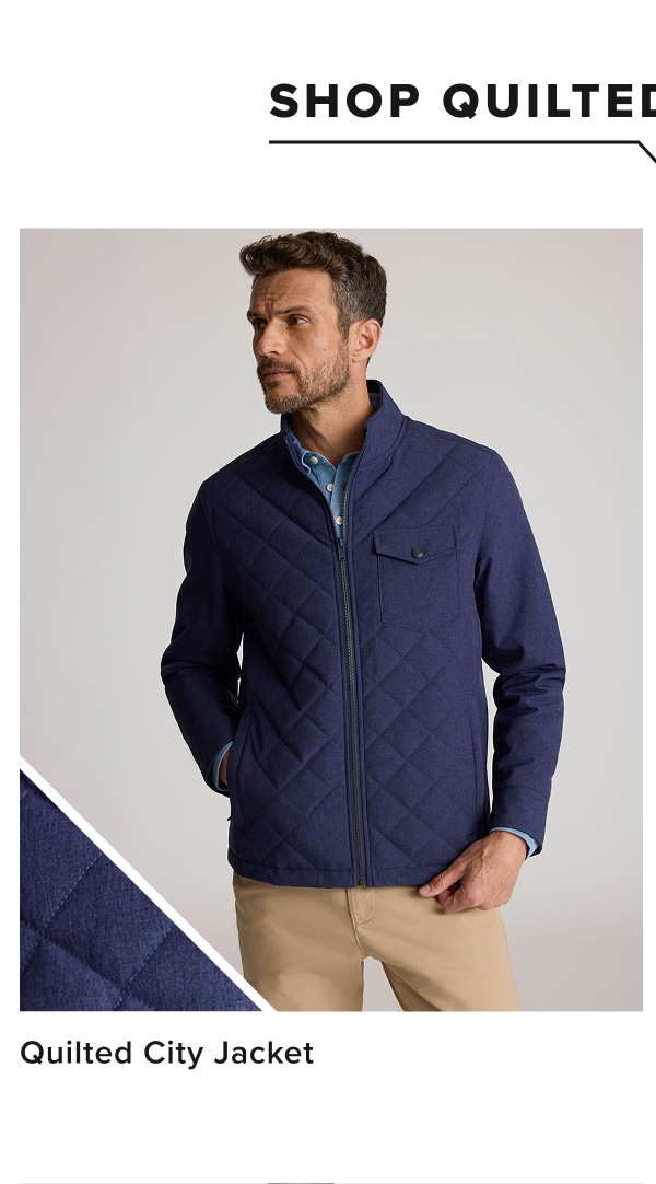 Model is wearing UNTUCKit Quilted city jacket. 