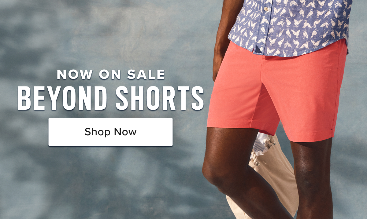 Model is wearing UNTUCKit beyond shorts. 