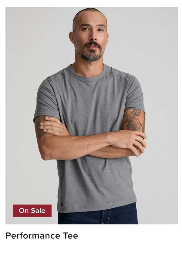 Model is wearing UNTUCKit performance tee in gray. Model is wearing UNTUCKit performance tee in gray.