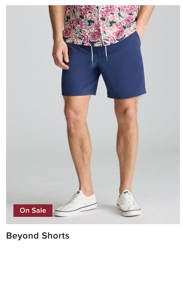 Model is wearing UNTUCKit beyond shorts in blue. Model is wearing UNTUCKit beyond shorts in blue.