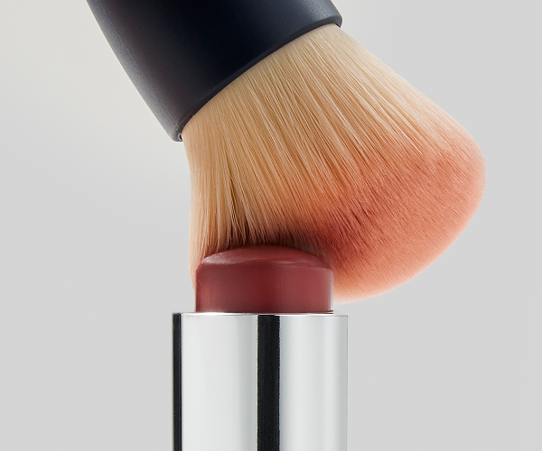 image of multi stick with applicator brush