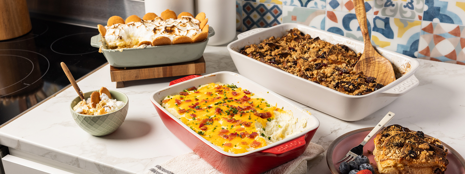 Collection of multiple colors of stoneware casserole dishes